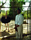 Ugonna at the zoo beside an Ostrich